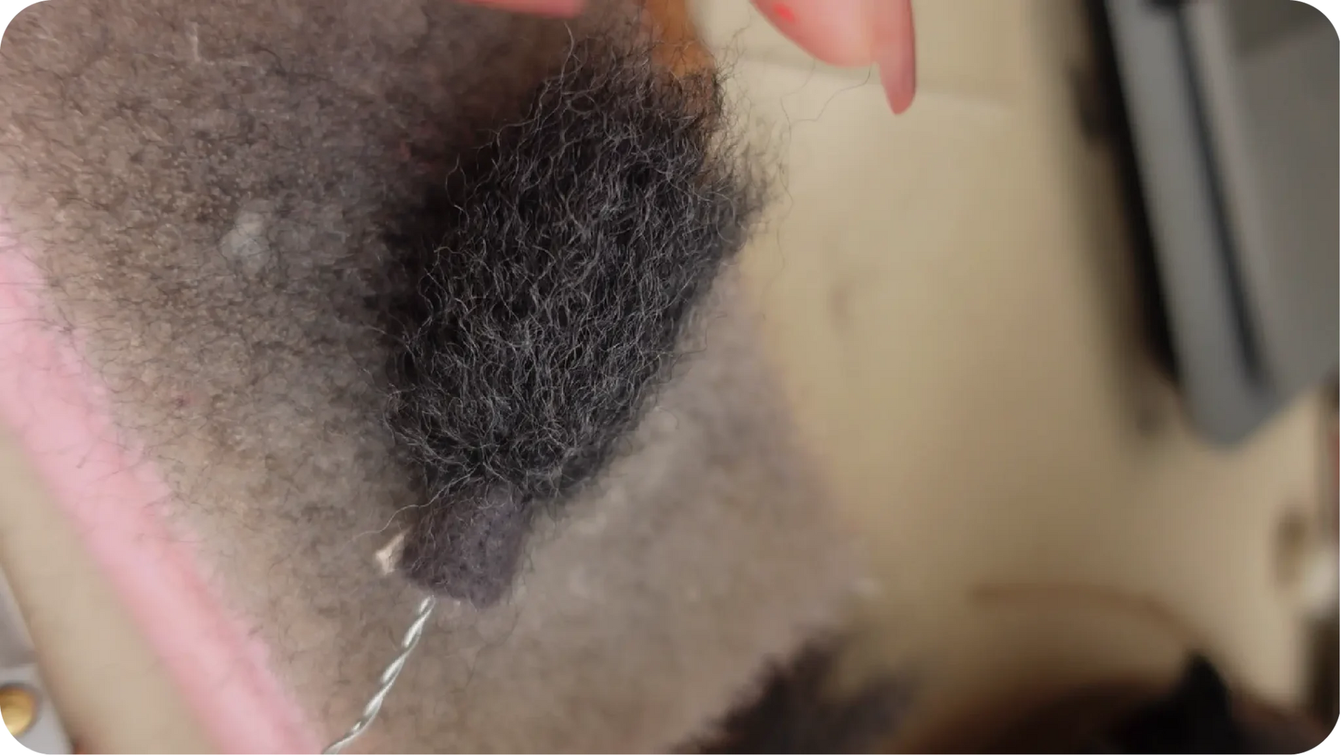 Needle-felted portrait making process step 6